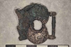 Cast copper-alloy strap junction dating to the 1st century BC.